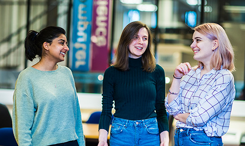 Three female students talking